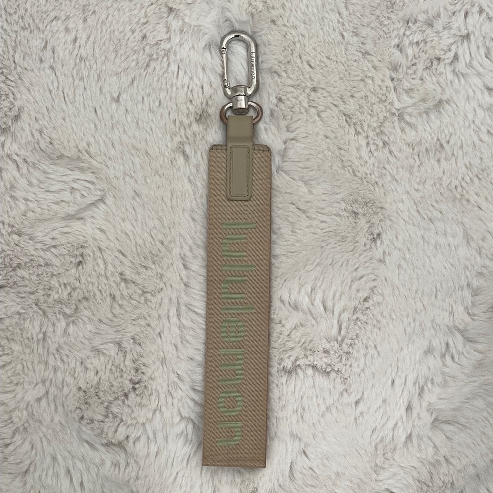 Lululemon Beige Keychain Strap with Green Logo
